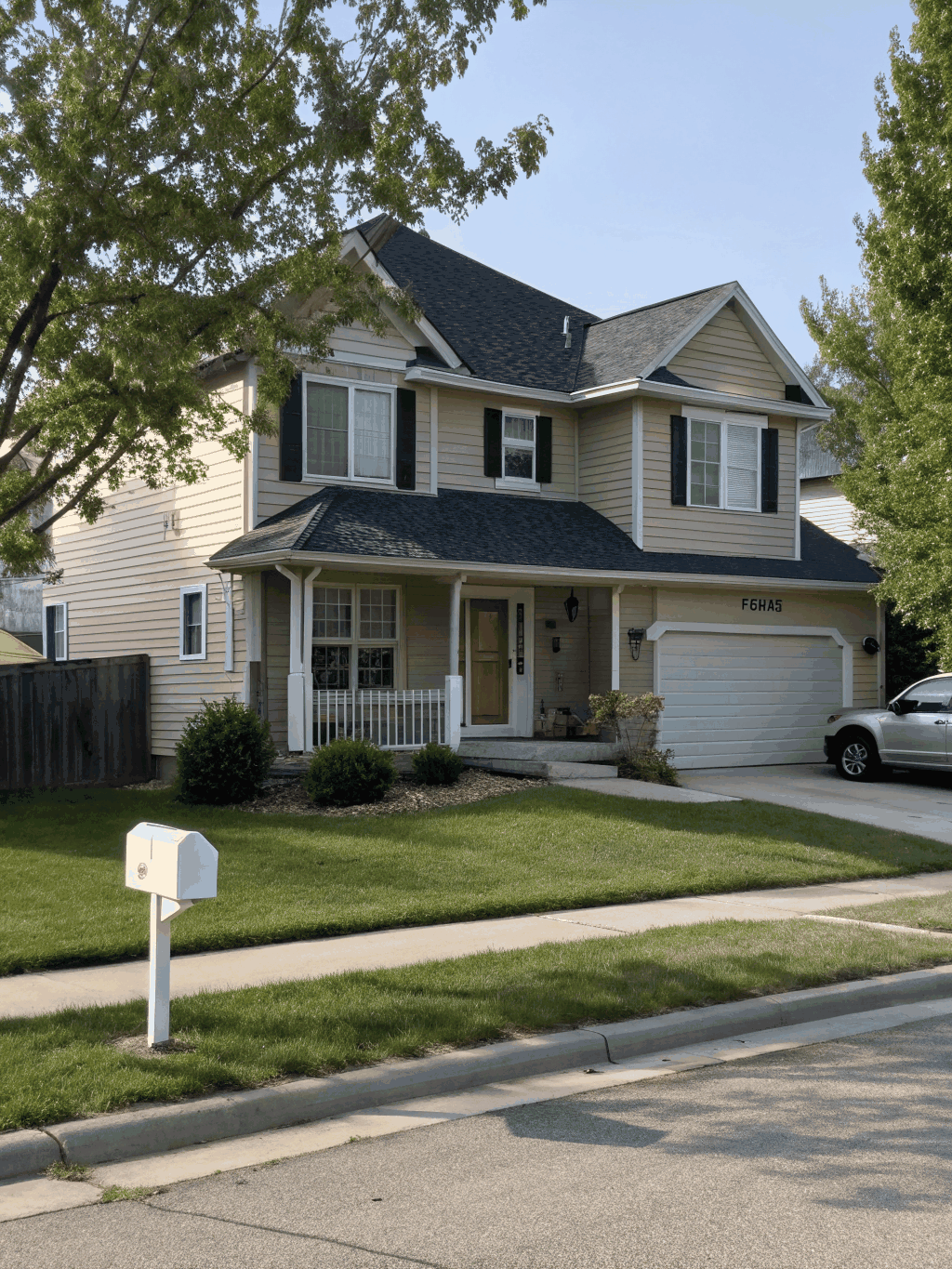 Charming suburban single-family residence with a well-manicured lawn in the Fox Valley area